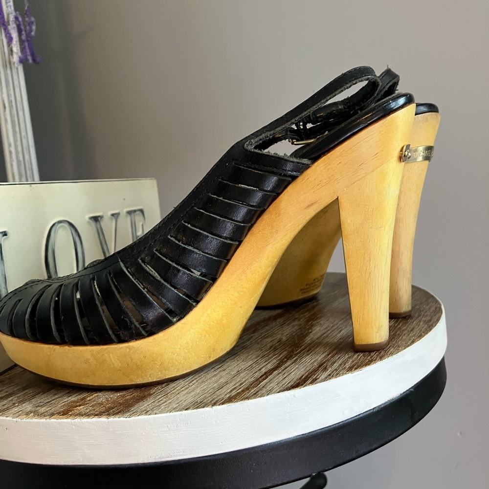 Size 7 1/2 Michael Kors platforms….. I have no idea if they are real or not. 5”